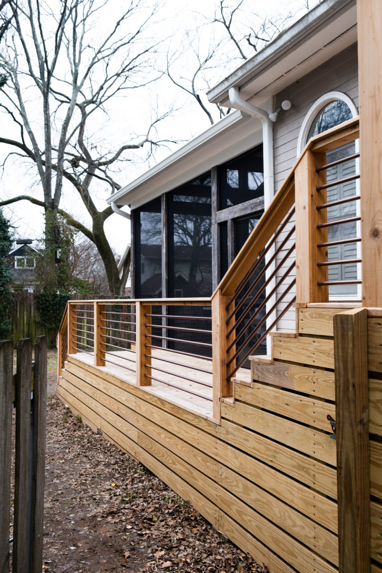 long wood deck at the side of a house