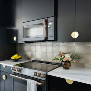 A view of remodeled kitchen cabinets and counters.