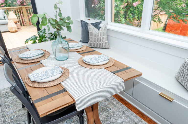 clean kitchen with plant on table