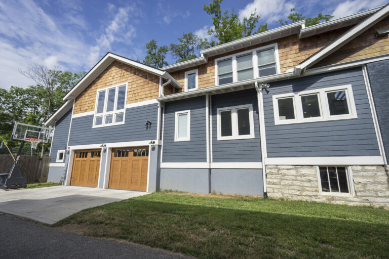 Historic home turned into renovation with a blue and brown house