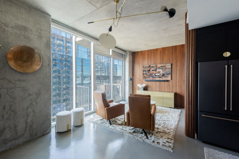 Home addition living room with long windows
